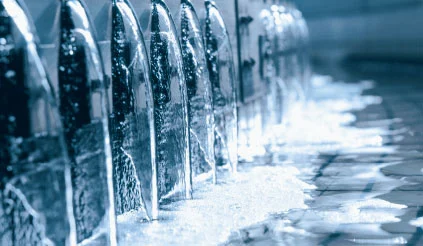 Clean, purified water flowing out of a treatment plant
